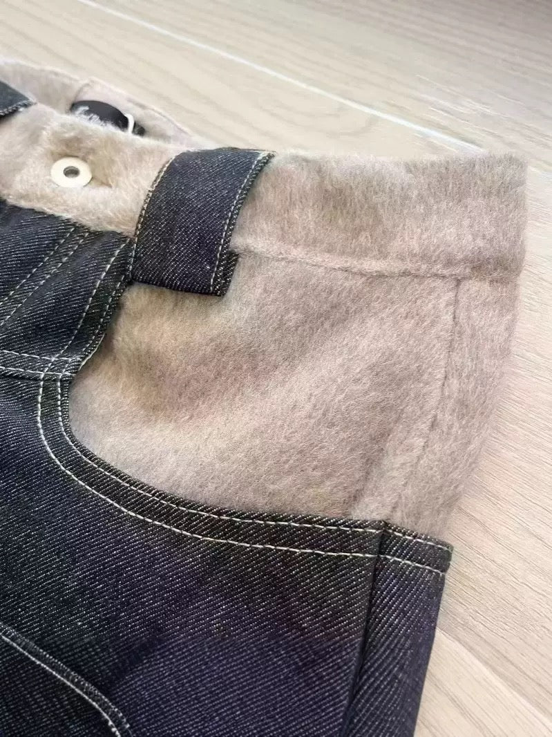 Felix Regem raw denim curved jeans hem detail